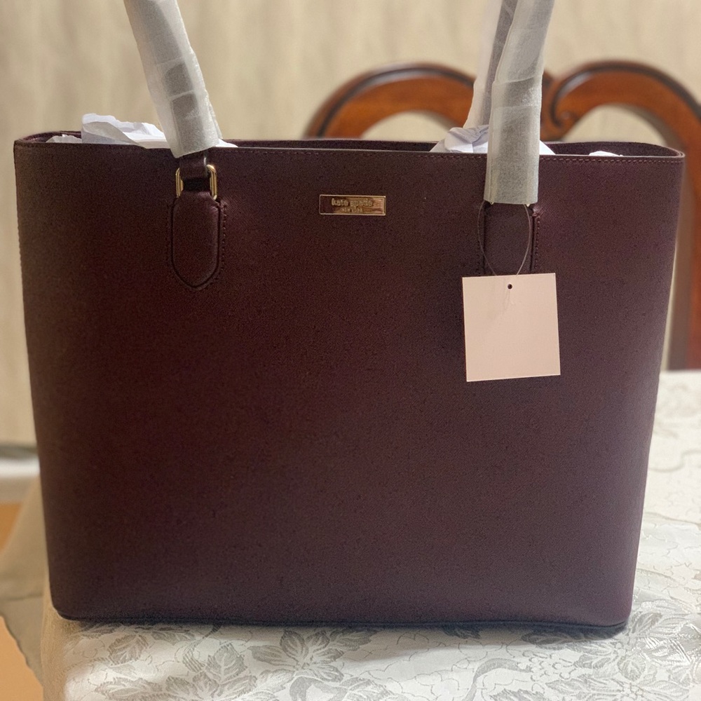 Kate Spade burgundy purse.
